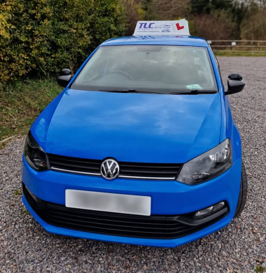 SOM7 magnetic driving school roof sign fitted to a blue Volkswagen Polo